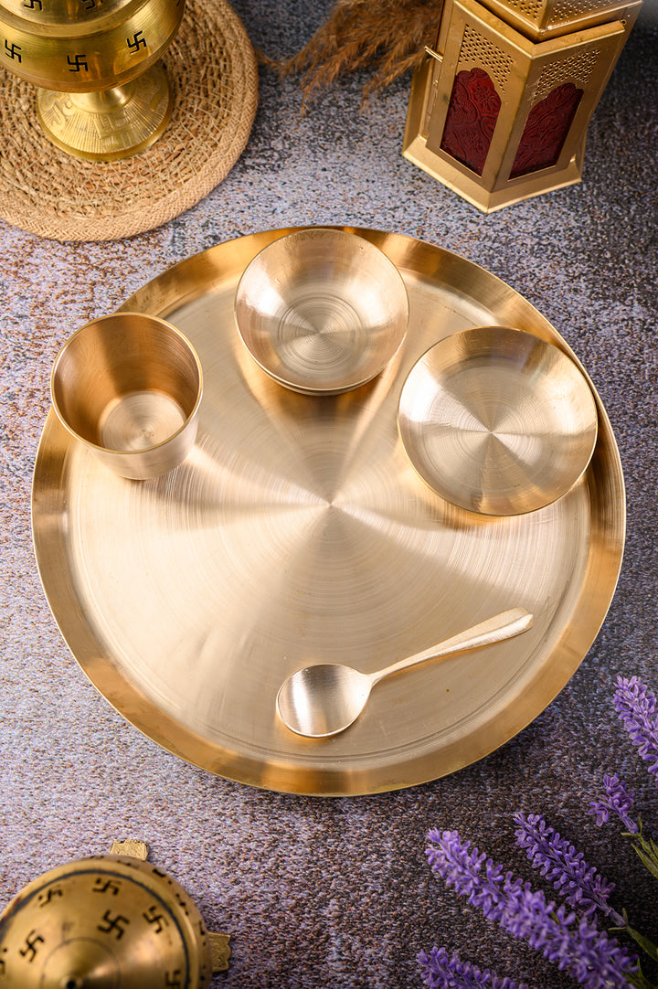 Kansa Dinner set featuring a 5-piece handmade bronze dish set with various bowls and a spoon.