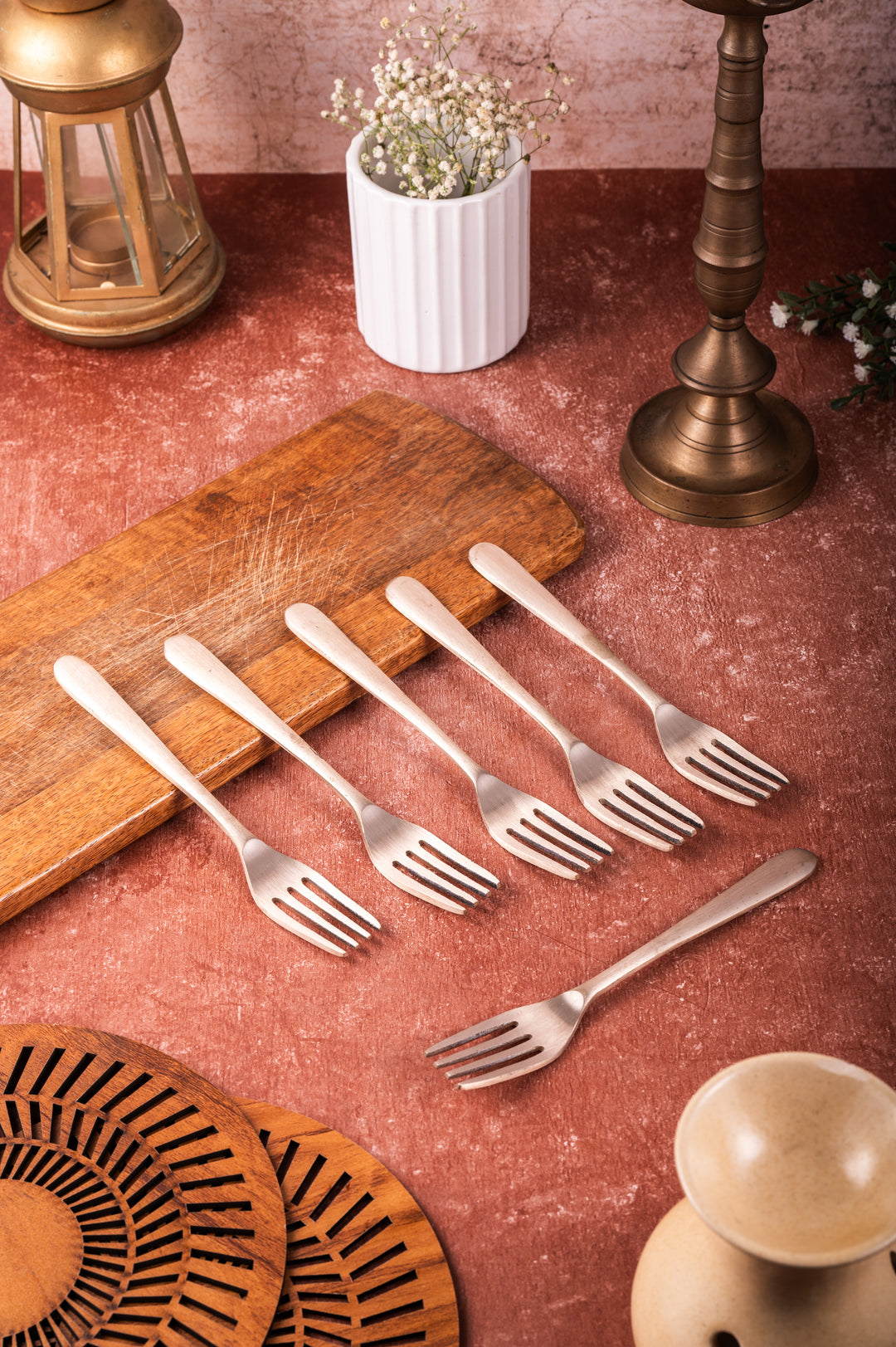 Bronze Fork Set / Cutlery Set – 6 Piece displayed on a table with decorative elements for elegant dining.
