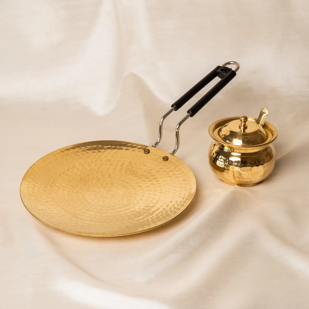 Brass tawa and ghee pot set by Kansawala